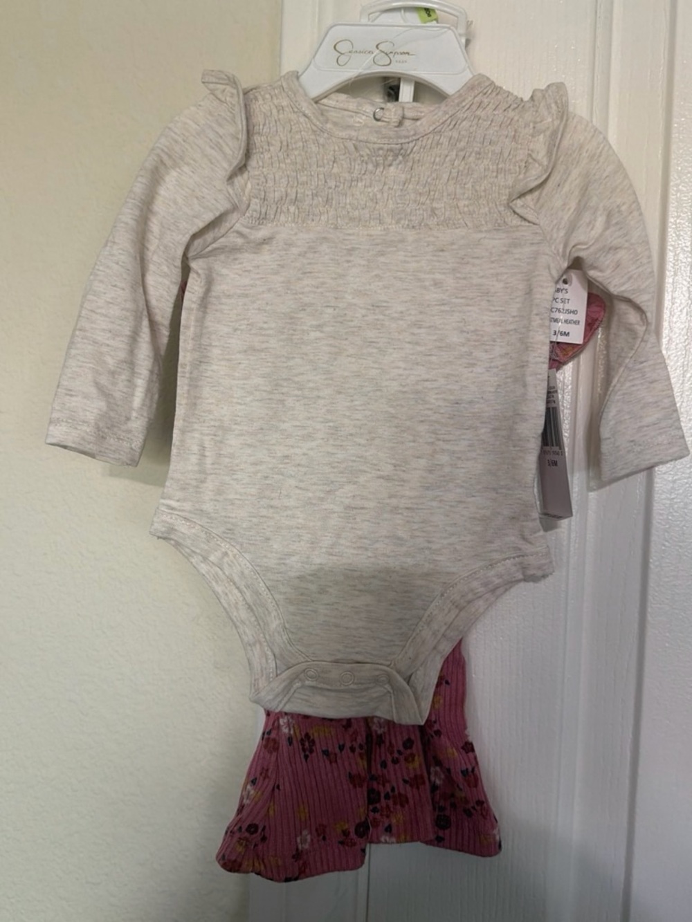Jessica Simpson Cream Long-Sleeve Smocked Baby One-Piece